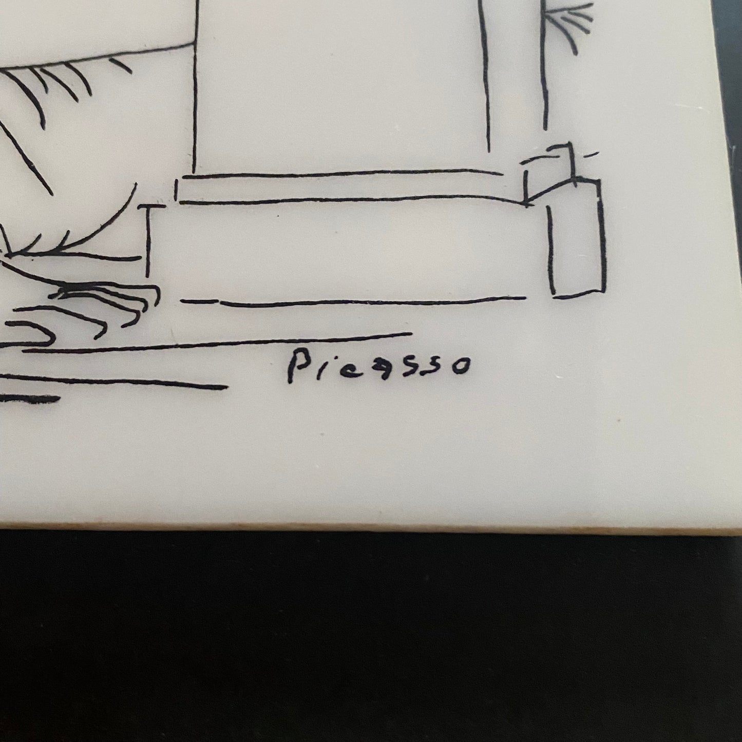 Signature Picasso — this ceramic tile is a reproduction of Pablo Picasso’s Sculptor at Rest with His Model, Anemones and Small Torso from the Vollard Suite.