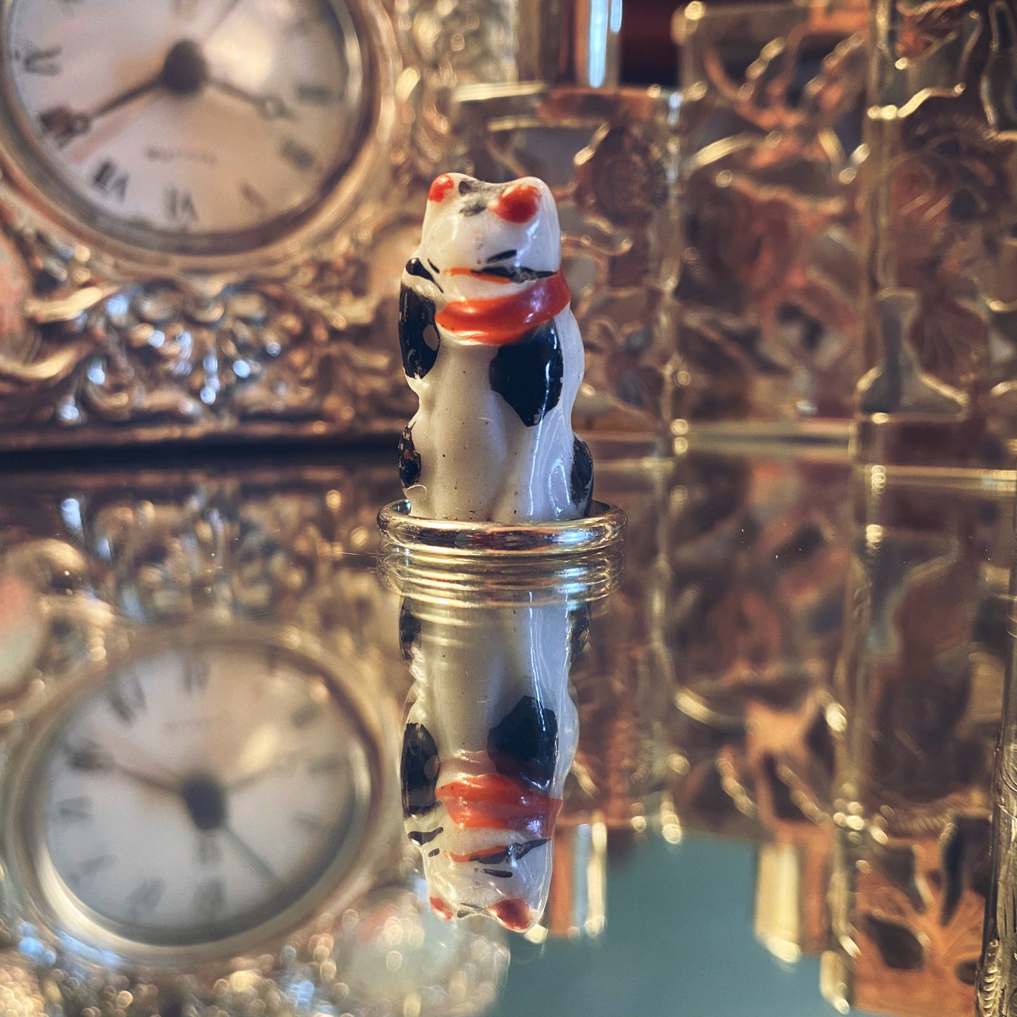 White gold ring with miniature porcelain cat