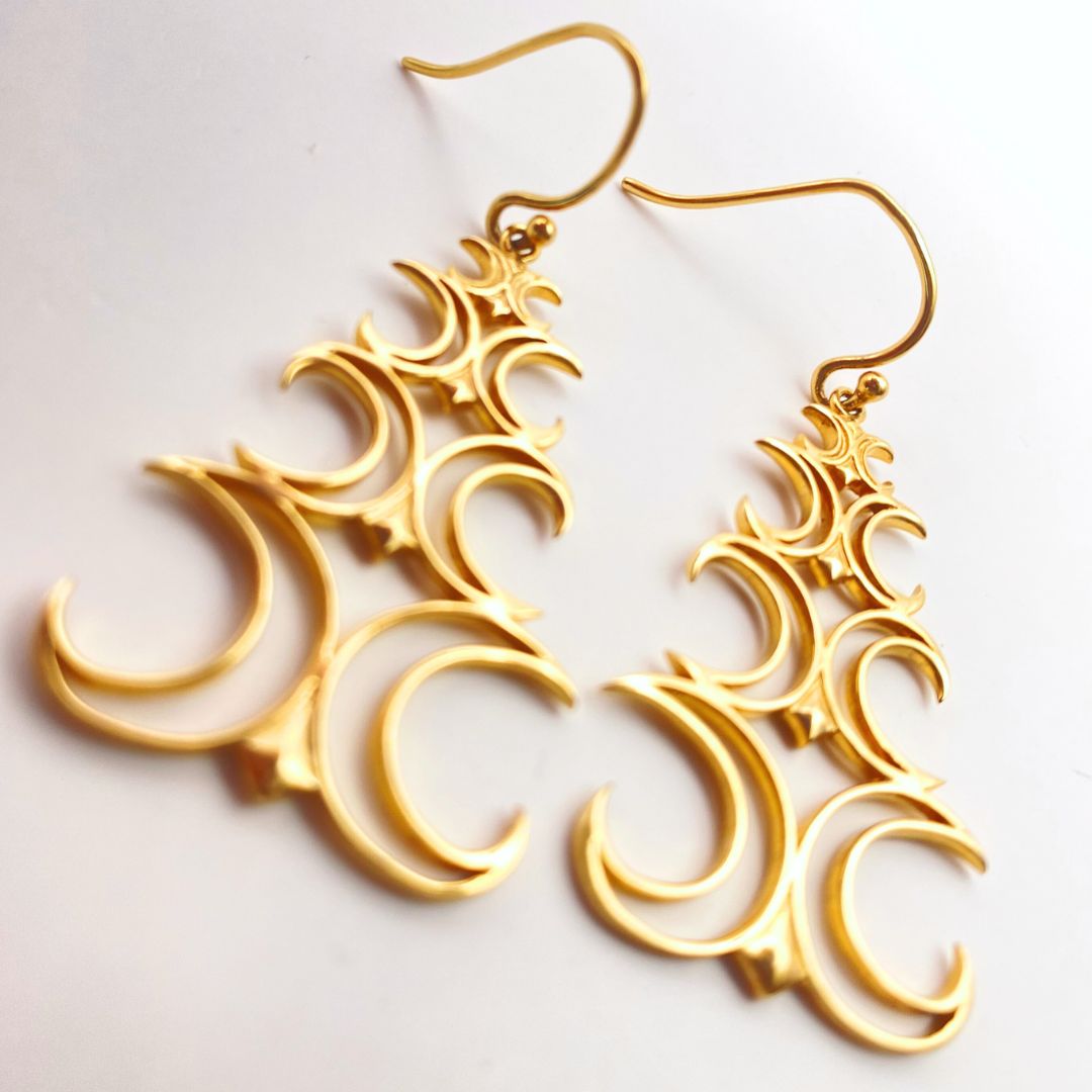 Gold mirrored crescent moon earrings