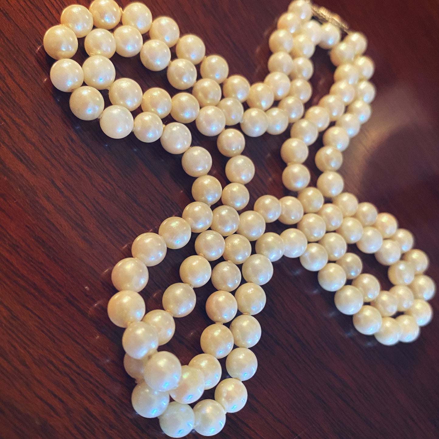 Long strand vintage faux pearl necklace with gold clasp 