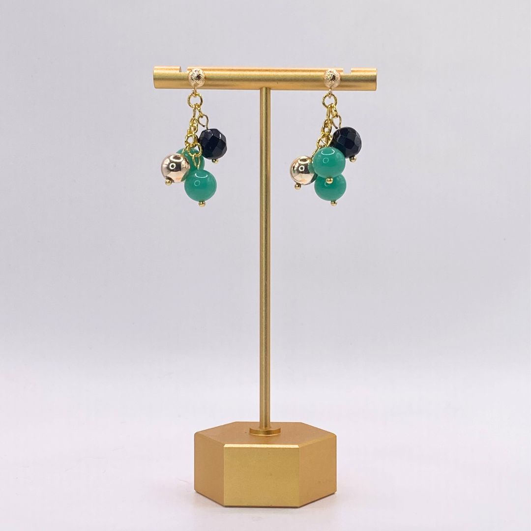 Vintage reclaimed gold plated earrings in black teal and gold