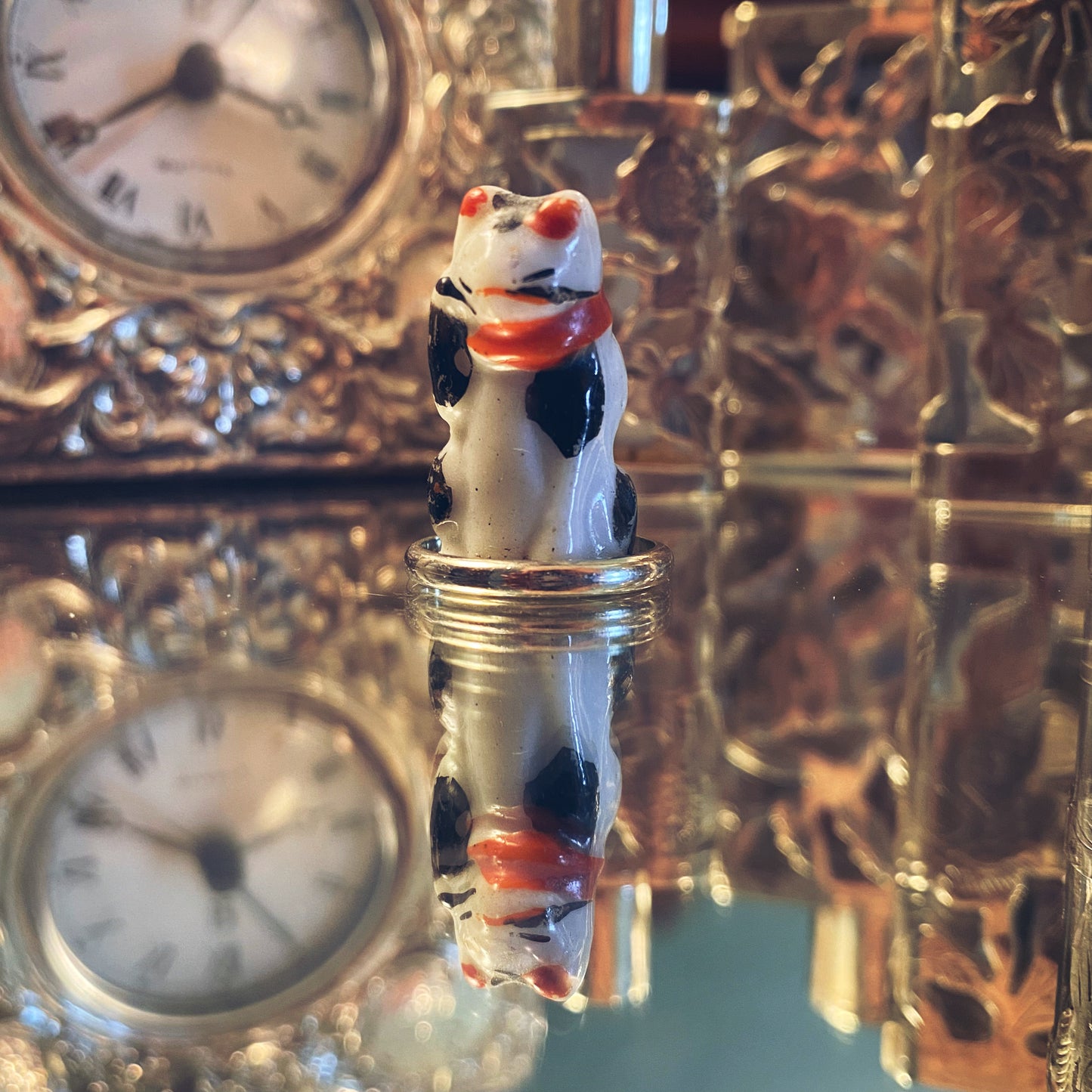 White gold ring with miniature porcelain cat 