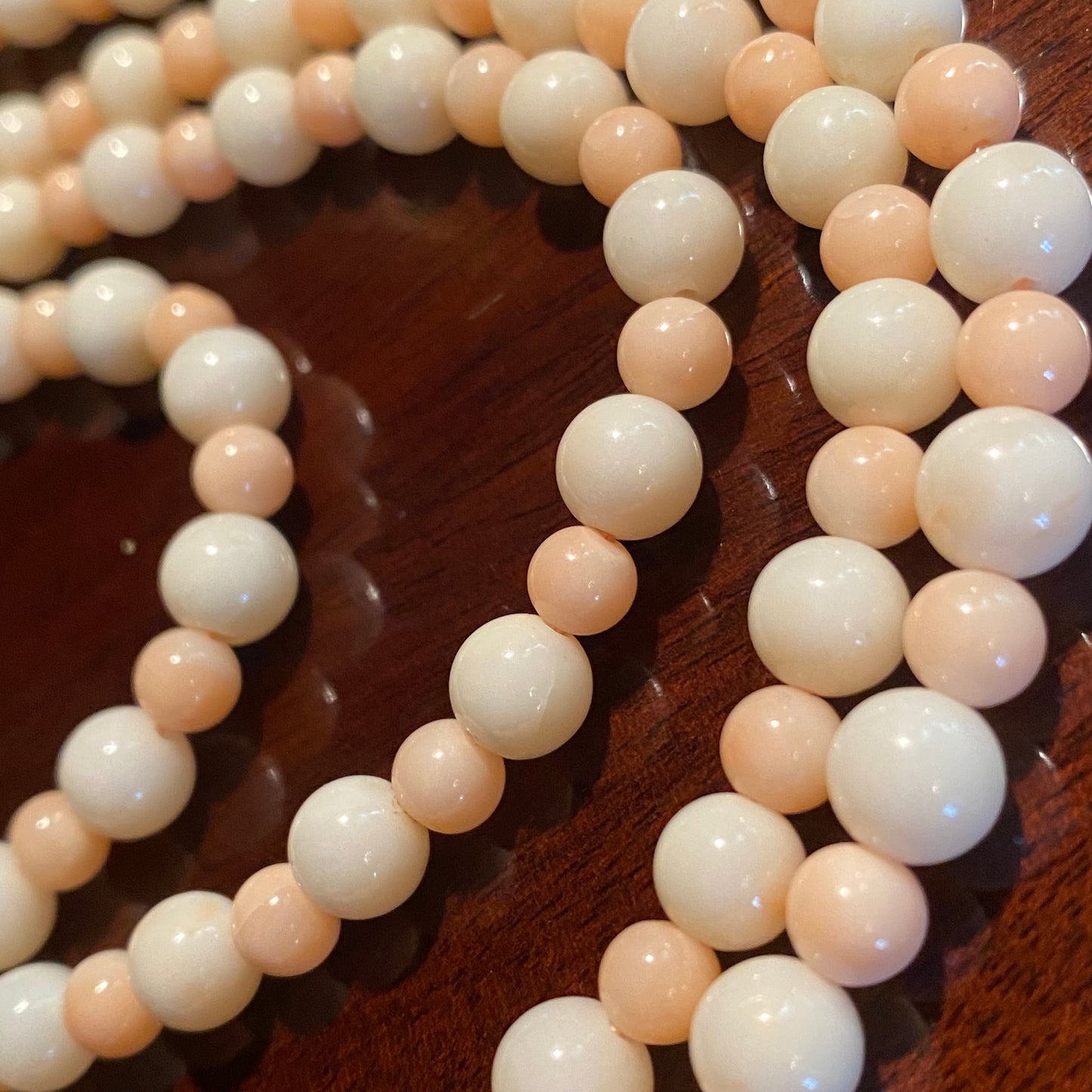 Long strand pink and white coral beaded necklace 