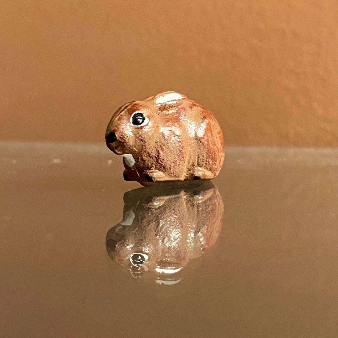 miniature painted metal rabbit