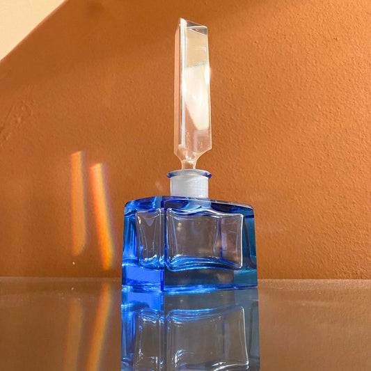 vintage cobalt blue crystal perfume bottle close up view